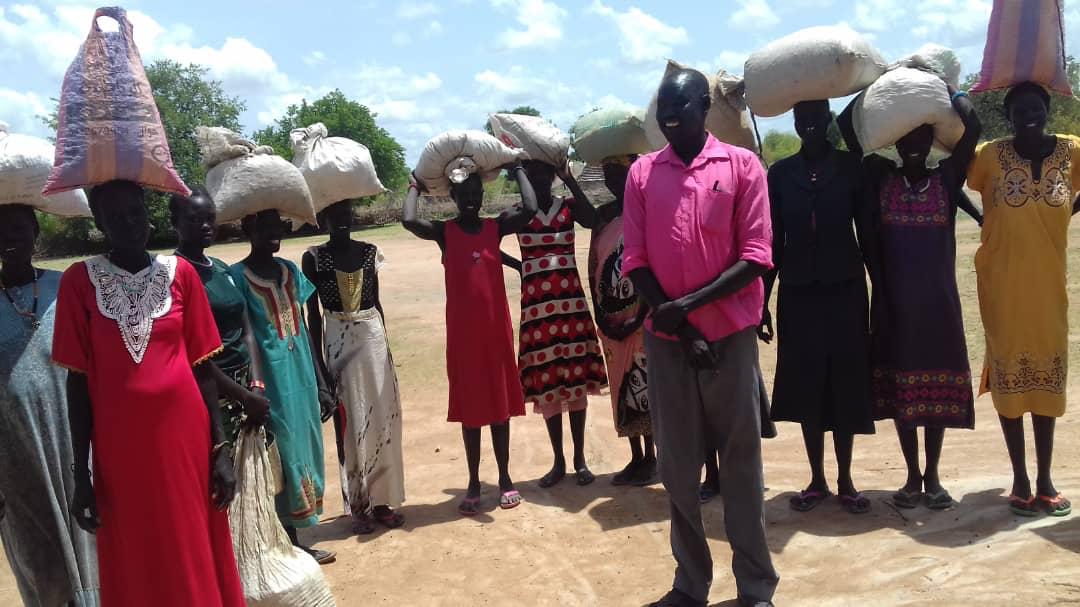 Women receiving seeds