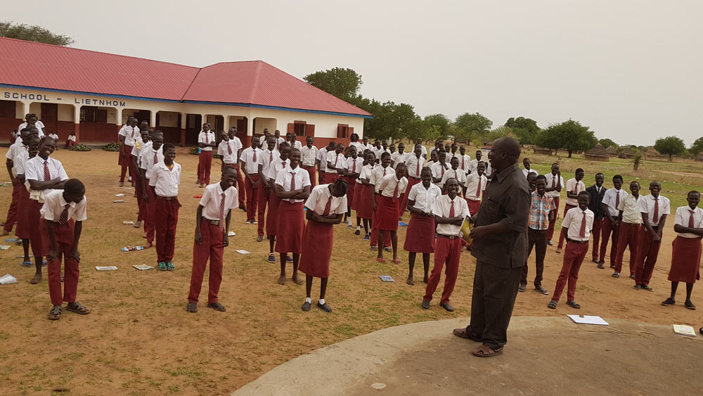 James speaking to Hope students